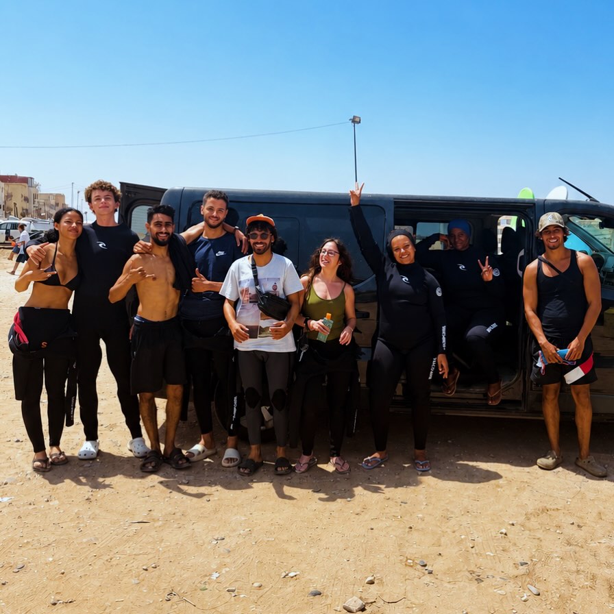 Amlal surf crew at the beach after a session